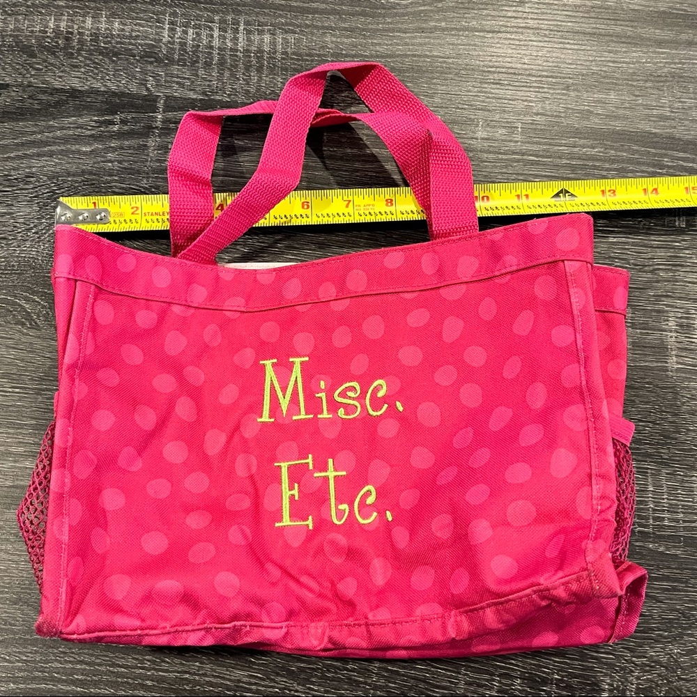 Thirty-one small utility tote.  Pink polka dots.  Green embroidery “Misc. Etc.”